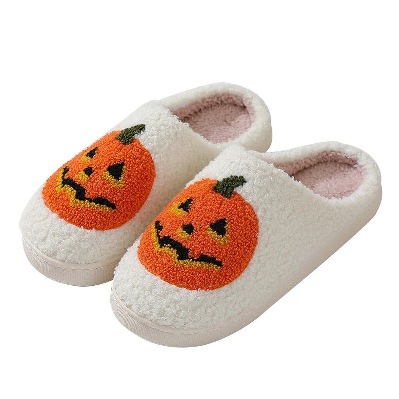 Cozy pumpkin-themed slippers with plush suede upper and non-slip rubber sole for indoor comfort