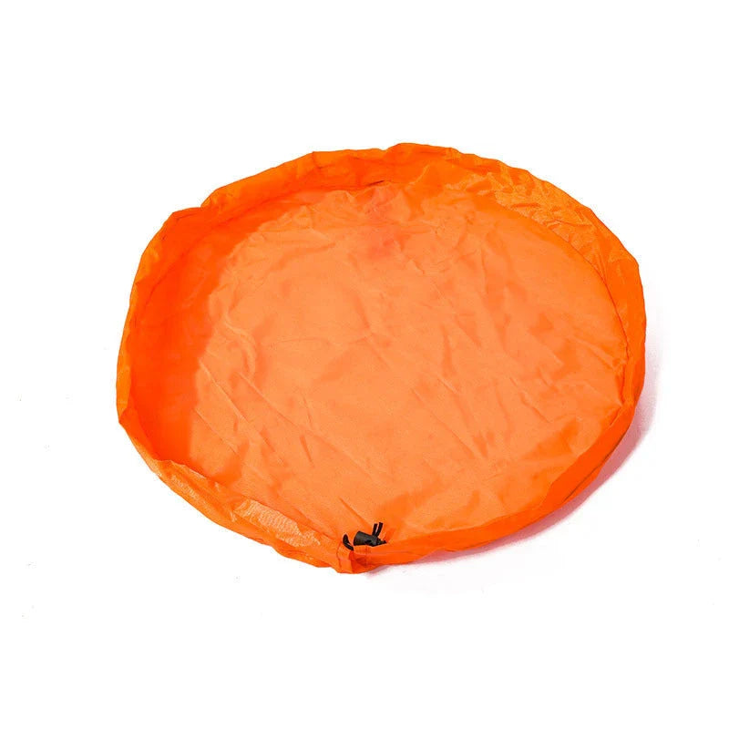 Versatile Picnic Pad made of durable nylon, featuring waterproof surface and ample storage for baby toys and essentials.