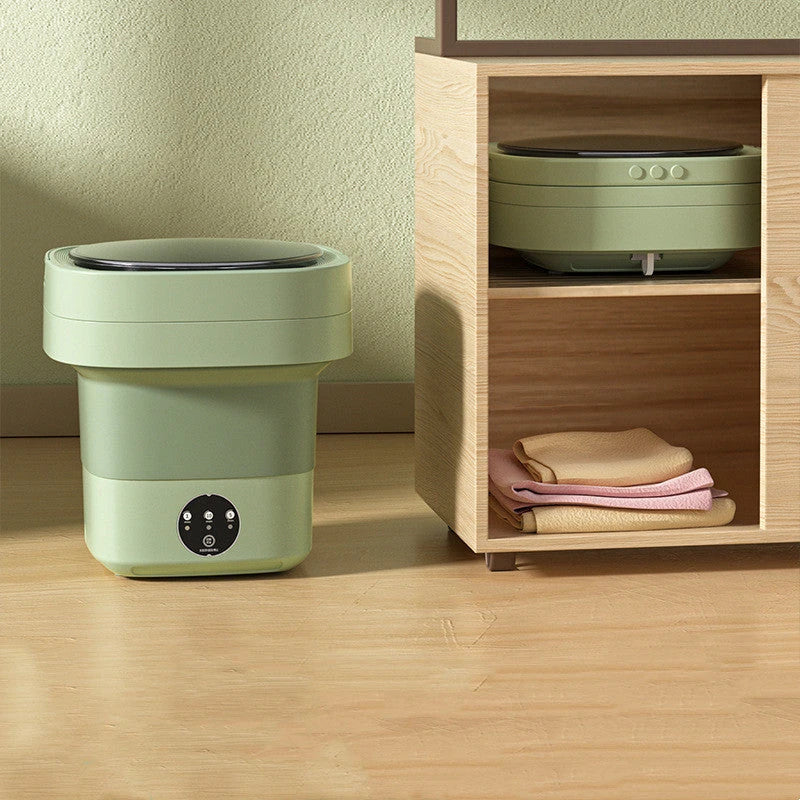 Compact folding washing machine for small spaces and travel, featuring a lightweight, portable design with powerful cleaning capabilities