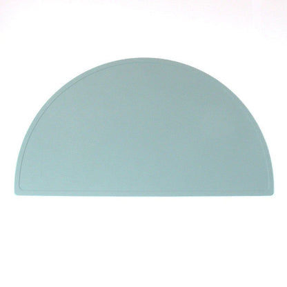 Durable silicone placemat in various colors, featuring waterproof and stain-resistant properties for easy cleaning