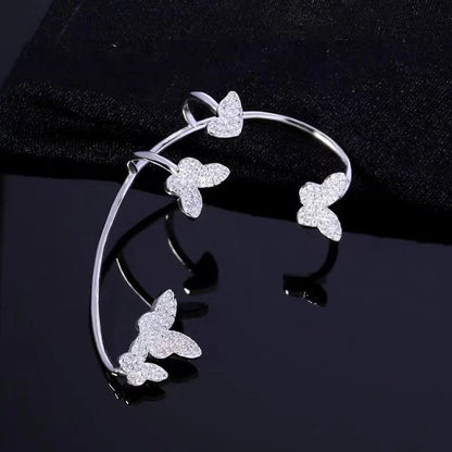 Sparkling butterfly-shaped ear cuffs with zirconia stones, available in gold and silver alloy finishes