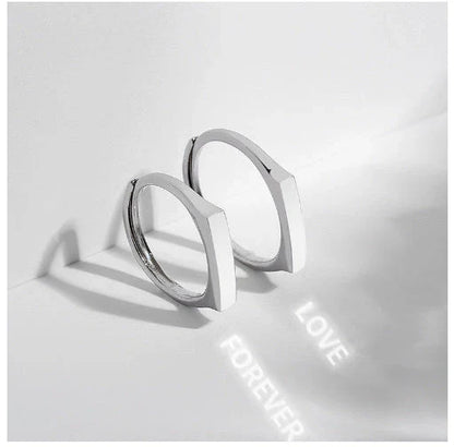 Stylish sterling silver rings with a hidden love pattern design, perfect for romantic gifts or personal accessorizing.