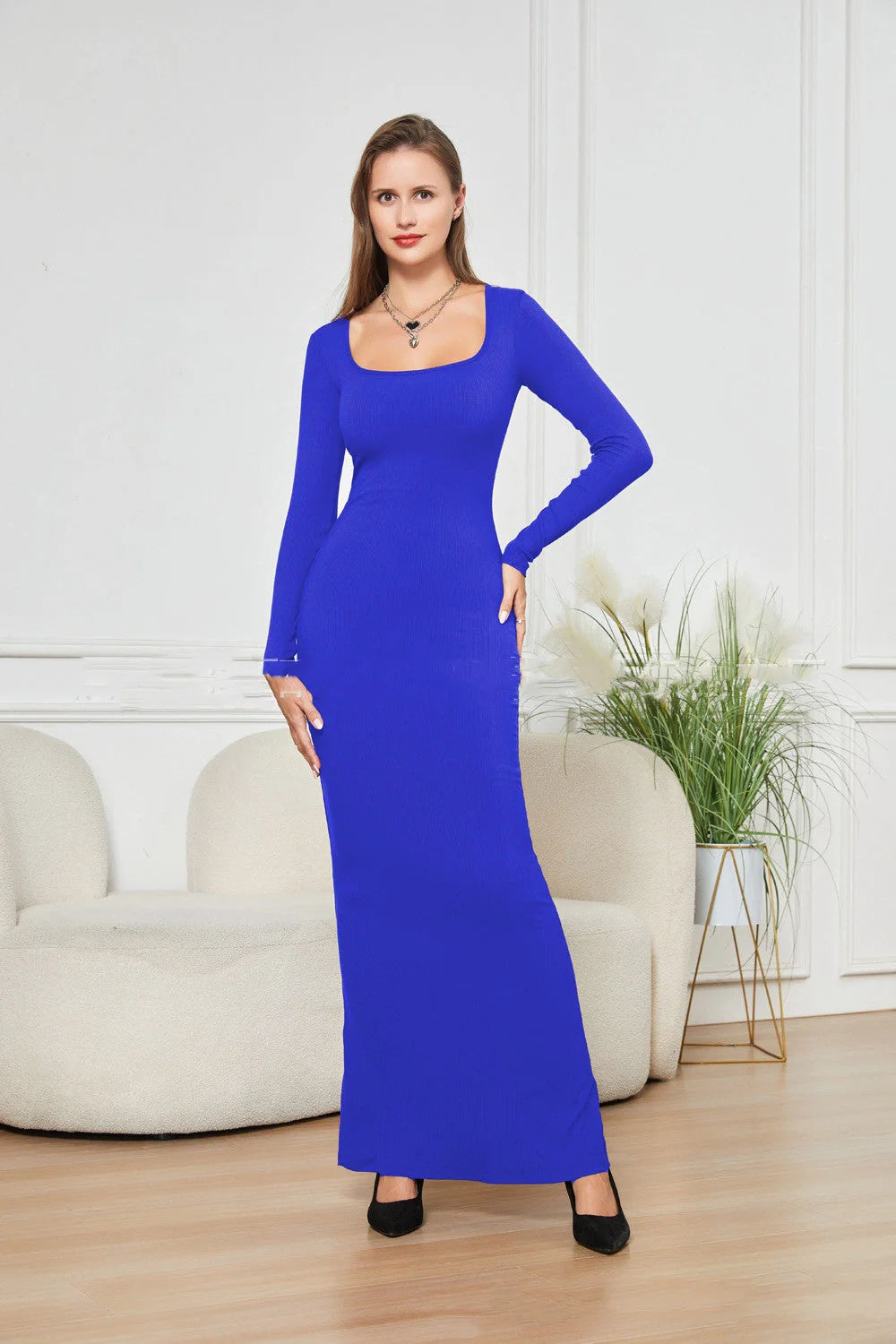 Double-layer slimming dress in black, featuring waist support and hip lifting design, perfect for any occasion.
