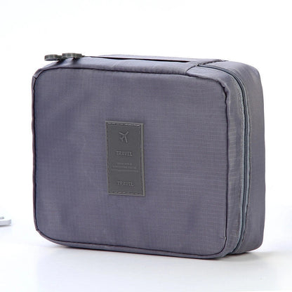 Premium toiletry bag with waterproof divider, multi-grid pockets, and durable Oxford cloth construction