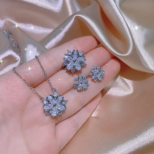 Exquisite zircon jewellery set with double-layered flower design and shimmering cubic zirconia stones