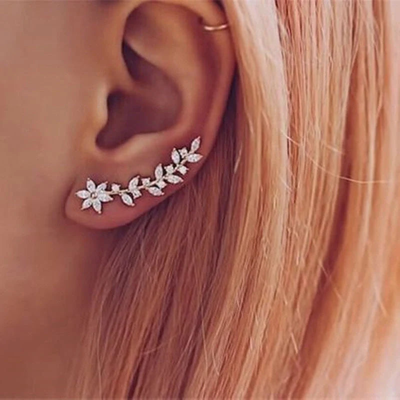 Stylish diamond flower earrings for women in white gold, gold, and rose gold