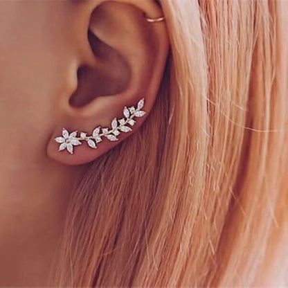 Stylish diamond flower earrings for women in white gold, gold, and rose gold