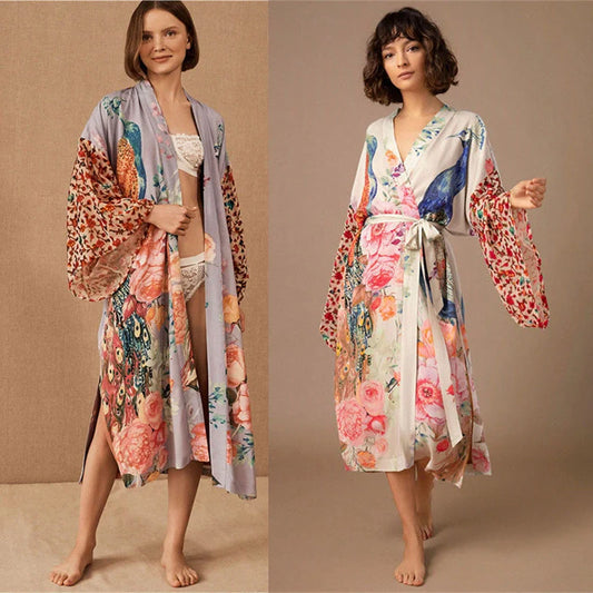 Elegant peacock-printed beach cover-up with lightweight, breathable fabric for stylish sun protection