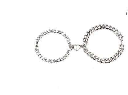 Elegant titanium steel couple bracelets with heart design, perfect for love gifts.