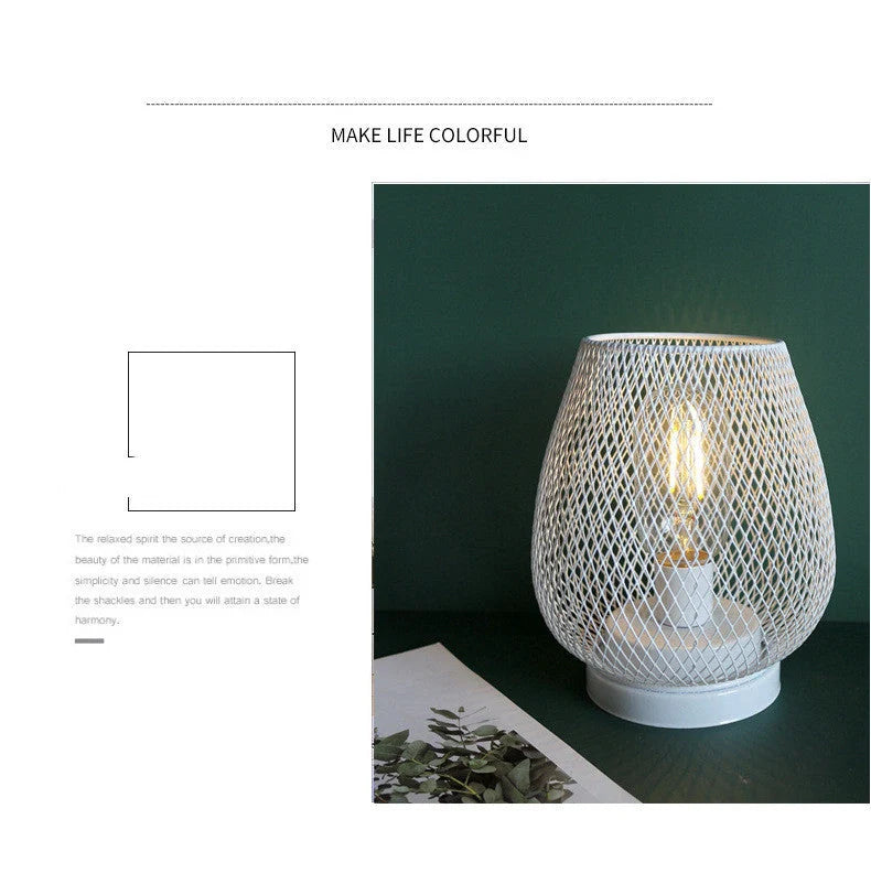 Retro iron art table lamp with hollowed out birdcage design and glass shade