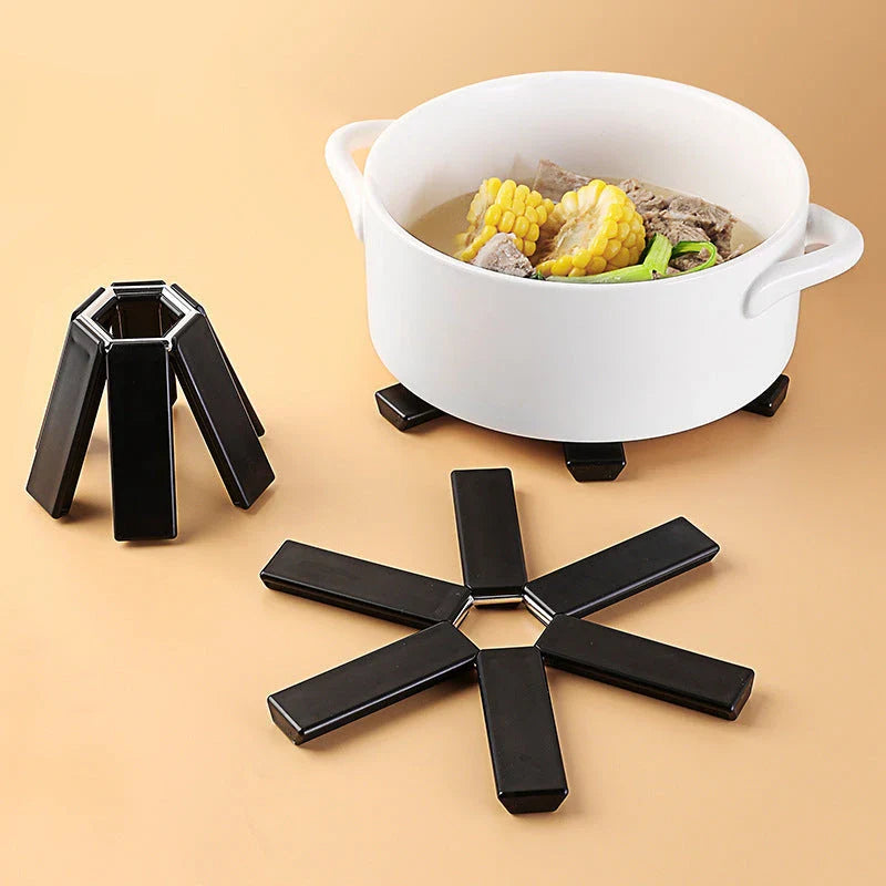 Durable heat-resistant folding pan mat made of high-quality ABS material for kitchen use