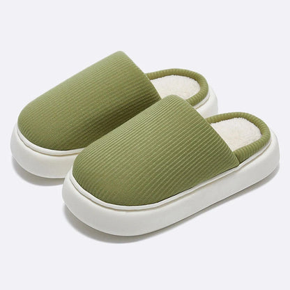 Cosy knitted fabric slippers in various colours and sizes, designed for couples to enjoy comfortable indoor relaxation.