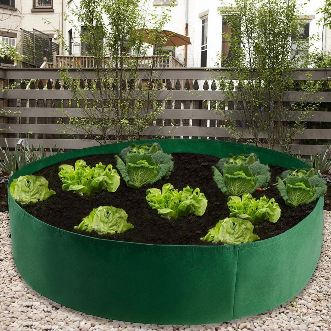 Round black and green fabric grow bags for garden plants with automatic drainage