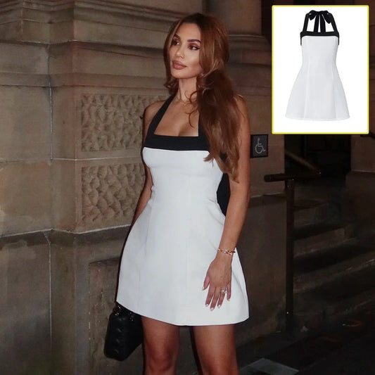 Black and White Halter Mini Dress with contrast colour design, A-line skirt, and sleeveless fit for spring and summer wear.