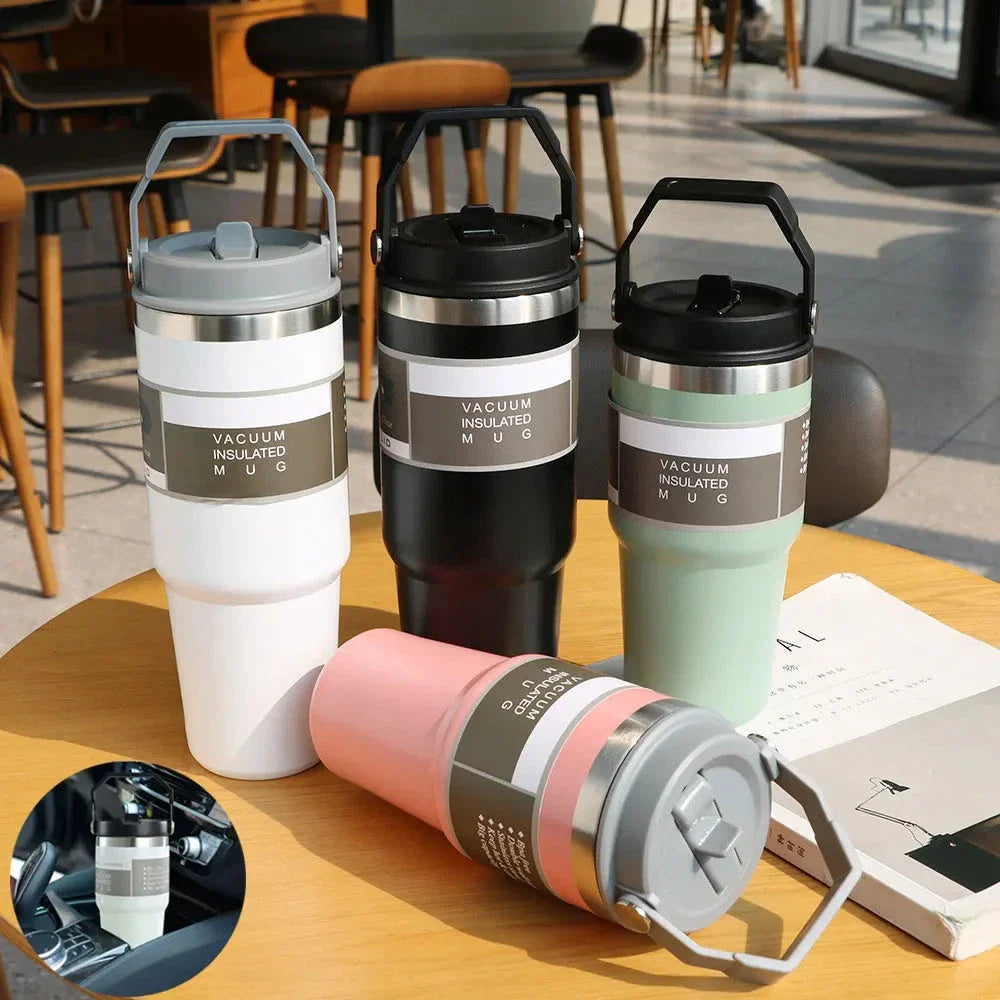Stainless steel insulated tumbler with handle, available in multiple colors and sizes, designed to keep drinks hot or cold for hours.