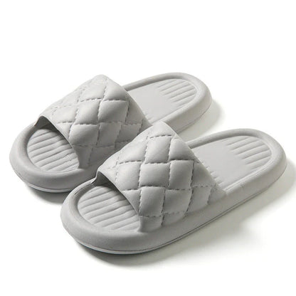 Comfortable and lightweight home slippers with a unique rhombus pattern, waterproof and odor-resistant EVA material, and a non-slip sole for safe indoor wear.