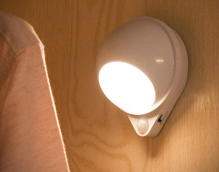 A versatile smart sensor lamp with a 360-degree rotating head and magnetic backing for easy installation on any iron surface.