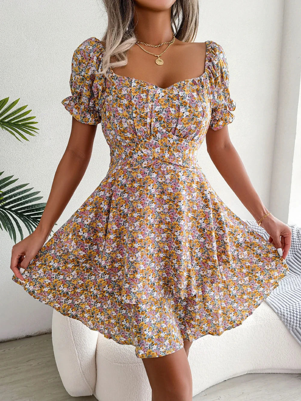 Stylish floral mini dress with A-line silhouette, high waist, and ruffled hem in various vibrant colors