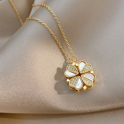 Luxe four-leaf clover pendant necklace crafted with stainless steel and crystal heart charm for women