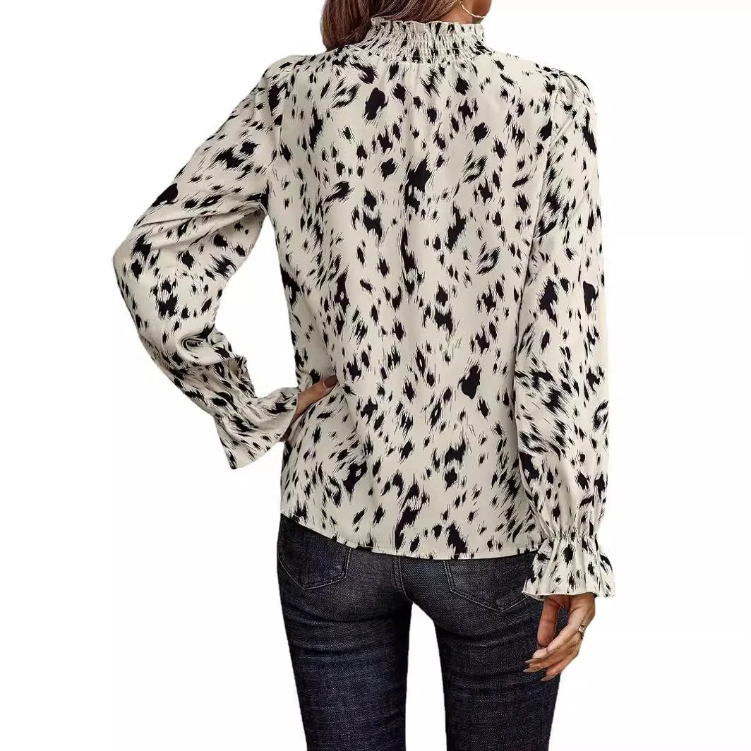 Stylish women's long sleeve turtleneck top in white, perfect for chilly days.