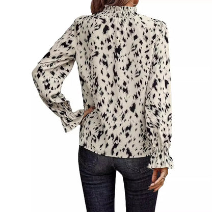 Stylish women's long sleeve turtleneck top in white, perfect for chilly days.