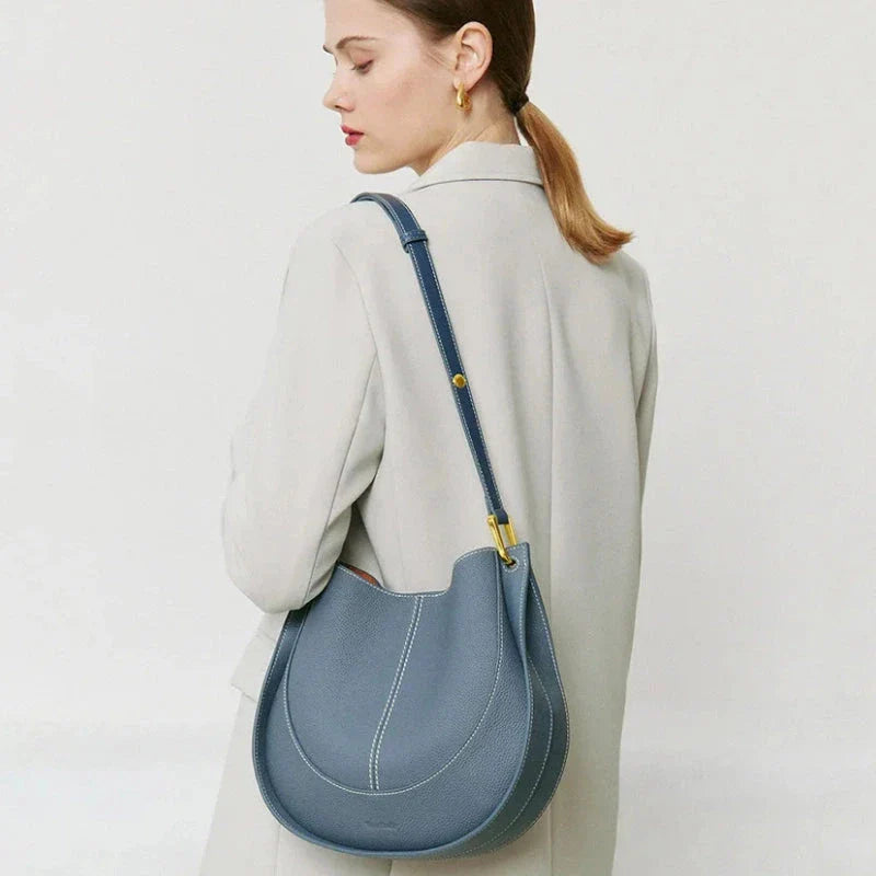 Large genuine leather women's hobo shoulder tote bag in blue with soft, supple texture and ample interior compartments