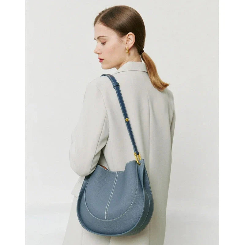 Large genuine leather women's hobo shoulder tote bag in blue with soft, supple texture and ample interior compartments