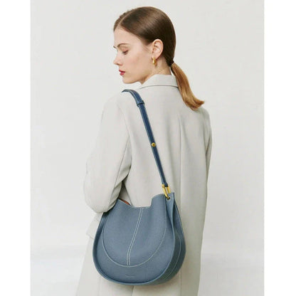 Large genuine leather women's hobo shoulder tote bag in blue with soft, supple texture and ample interior compartments
