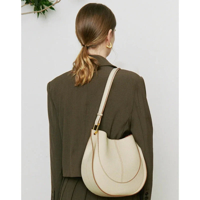 Large genuine leather women's hobo shoulder tote bag in blue with soft, supple texture and ample interior compartments