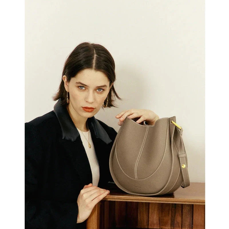 Large genuine leather women's hobo shoulder tote bag in blue with soft, supple texture and ample interior compartments
