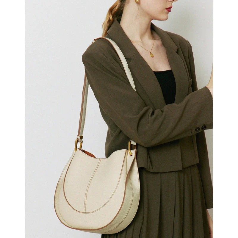 Large genuine leather women's hobo shoulder tote bag in blue with soft, supple texture and ample interior compartments