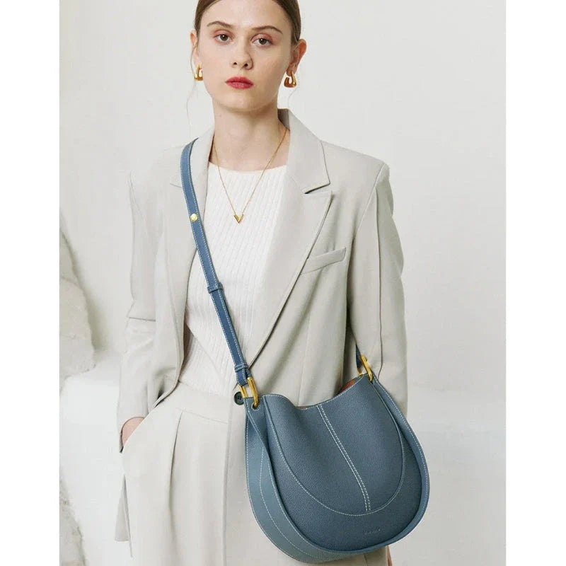 Large genuine leather women's hobo shoulder tote bag in blue with soft, supple texture and ample interior compartments