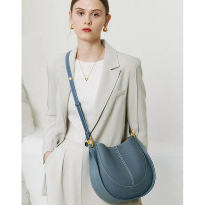 Large genuine leather women's hobo shoulder tote bag in blue with soft, supple texture and ample interior compartments
