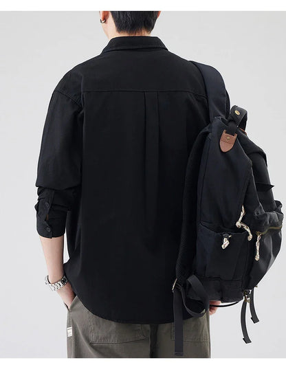 LKTM men's long-sleeved shirt in black, white, and grey colours, featuring a classic American-inspired design and premium cotton construction
