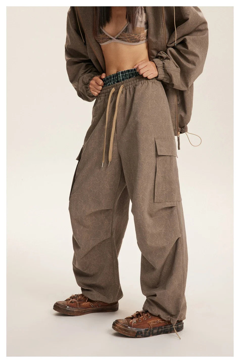 Retro baggy straight trousers in khaki colour, featuring a relaxed, straight-leg silhouette and premium polyester fabric for comfortable, everyday wear.