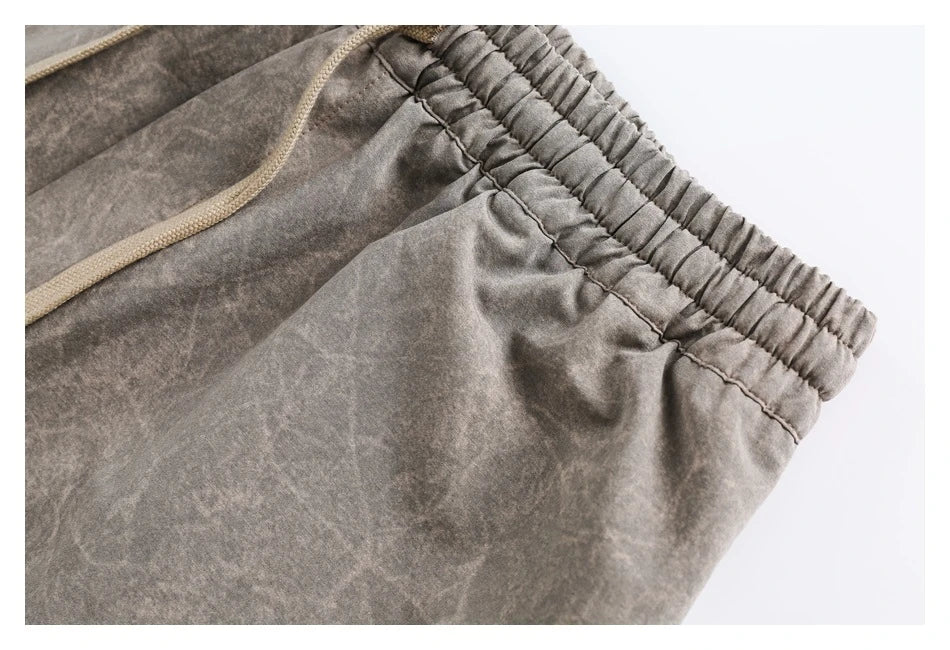 Retro baggy straight trousers in khaki colour, featuring a relaxed, straight-leg silhouette and premium polyester fabric for comfortable, everyday wear.