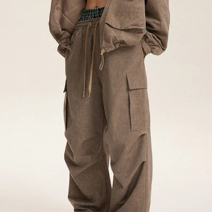 Retro baggy straight trousers in khaki colour, featuring a relaxed, straight-leg silhouette and premium polyester fabric for comfortable, everyday wear.