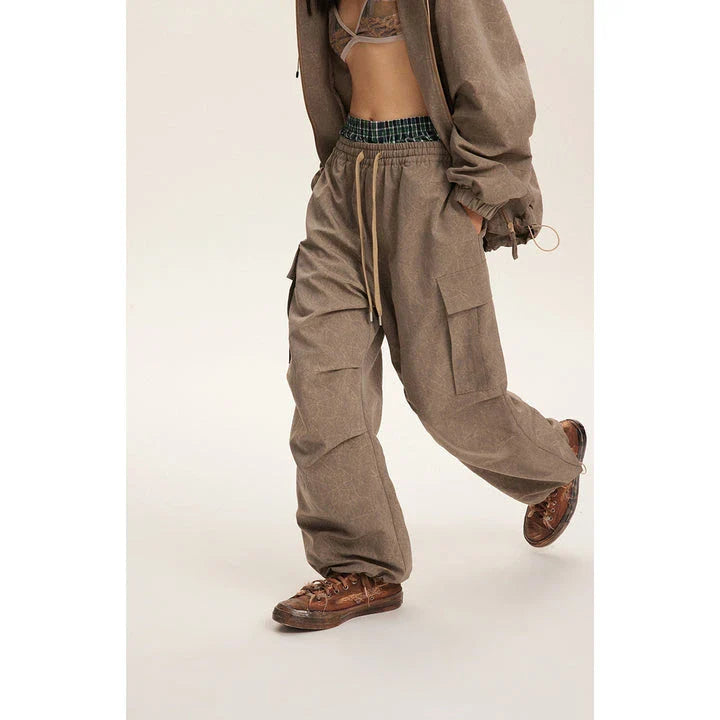 Retro baggy straight trousers in khaki colour, featuring a relaxed, straight-leg silhouette and premium polyester fabric for comfortable, everyday wear.