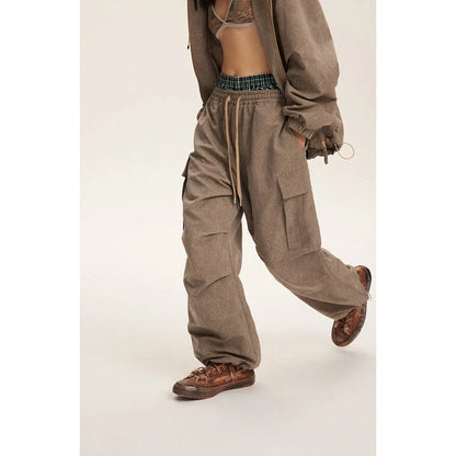 Retro baggy straight trousers in khaki colour, featuring a relaxed, straight-leg silhouette and premium polyester fabric for comfortable, everyday wear.
