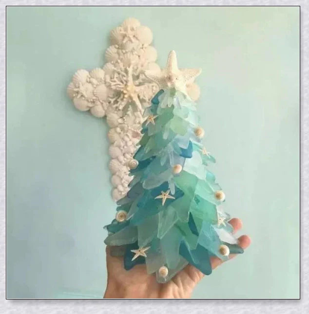 Handcrafted sea glass Christmas tree with blue, green, and turquoise sea glass, seashells, and starfish