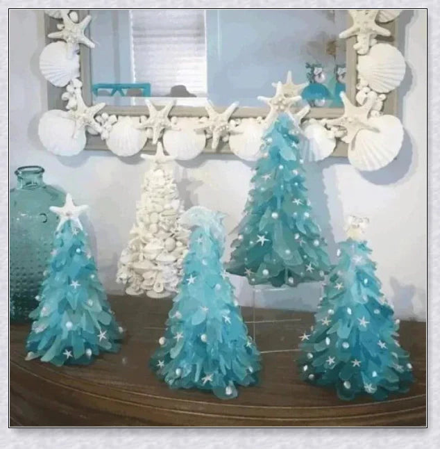Handcrafted sea glass Christmas tree with blue, green, and turquoise sea glass, seashells, and starfish