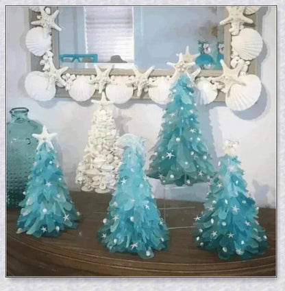 Handcrafted sea glass Christmas tree with blue, green, and turquoise sea glass, seashells, and starfish