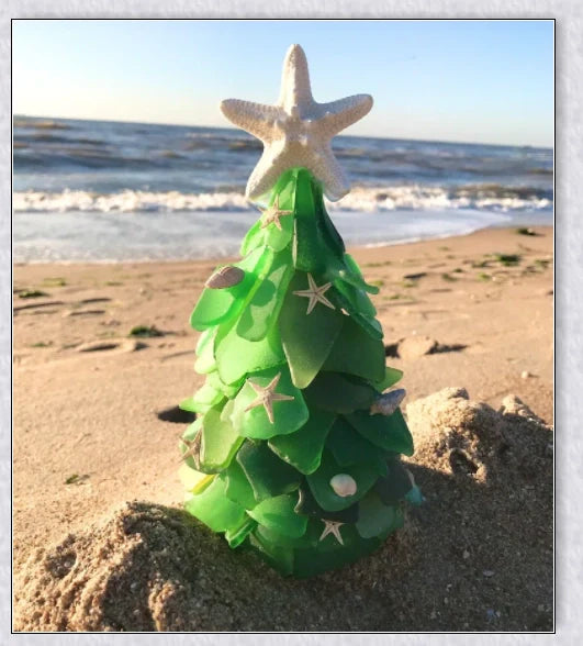 Handcrafted sea glass Christmas tree with blue, green, and turquoise sea glass, seashells, and starfish
