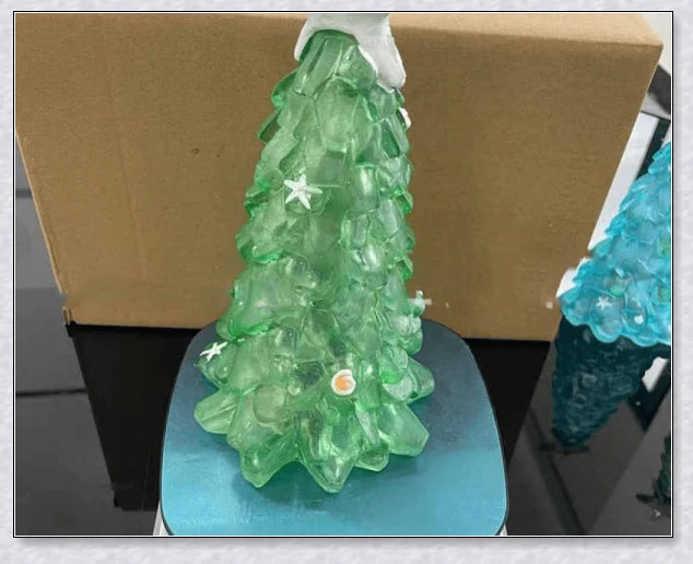 Handcrafted sea glass Christmas tree with blue, green, and turquoise sea glass, seashells, and starfish
