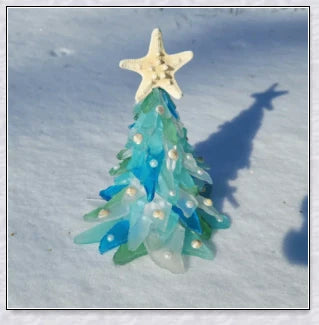 Handcrafted sea glass Christmas tree with blue, green, and turquoise sea glass, seashells, and starfish