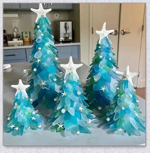 Handcrafted sea glass Christmas tree with blue, green, and turquoise sea glass, seashells, and starfish