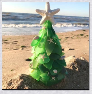 Handcrafted sea glass Christmas tree with blue, green, and turquoise sea glass, seashells, and starfish