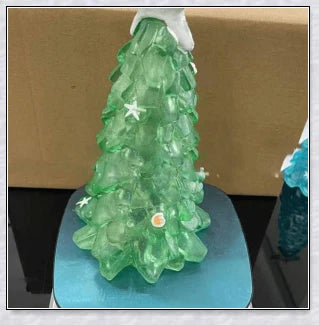 Handcrafted sea glass Christmas tree with blue, green, and turquoise sea glass, seashells, and starfish