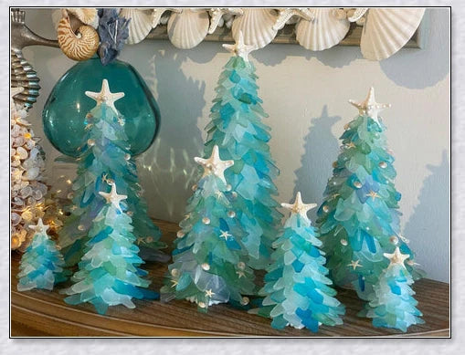 Handcrafted sea glass Christmas tree with blue, green, and turquoise sea glass, seashells, and starfish