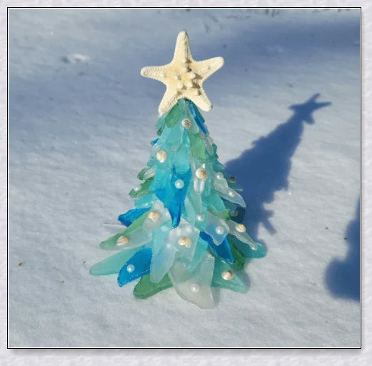 Handcrafted sea glass Christmas tree with blue, green, and turquoise sea glass, seashells, and starfish